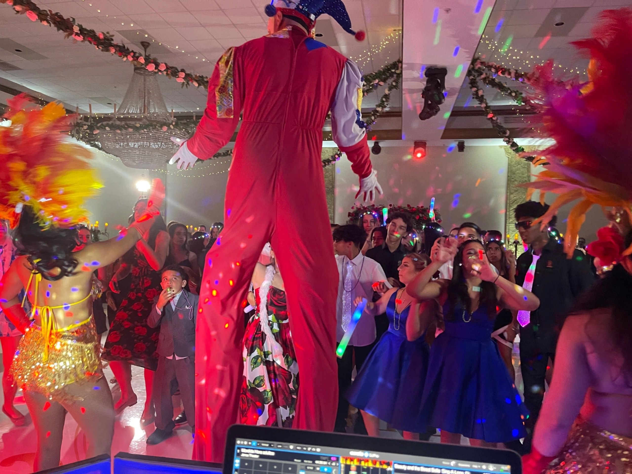 Hora Loca — costumes, neon lights, high-energy music